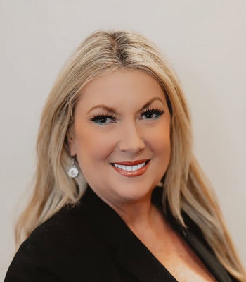 Portrait of Valerie Beck, Broker.